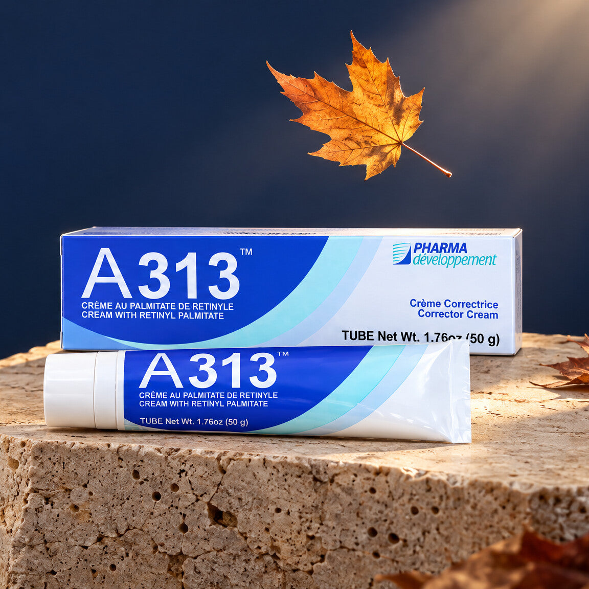 A313 retinol cream and box on a stone plinth with a falling autumn leaf